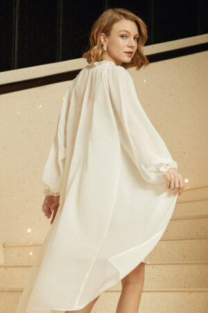 Portrait of model in MANITO lavender Wedding Women's Ruffle Silk Robe, focusing on ruffle trim and delicate spaghetti straps.