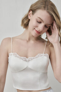 Close-up of MANITO Windy Lace Silk Camisole Top highlighting lace trim and bust shaping.