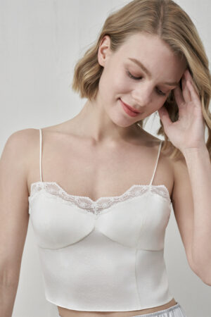 Close-up of MANITO Windy Lace Silk Camisole Top highlighting lace trim and bust shaping.
