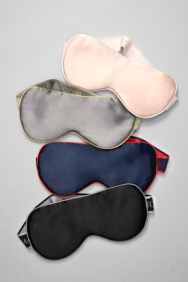 A collection of Duality Silk Eye Masks in a variety of colors, with bold colorways and special elastic straps designed to provide comfort and style.