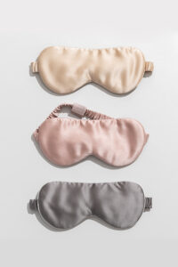 MANITO Eye Mask Renewal Subscription featuring silk eye masks in champagne, pink, and gray.