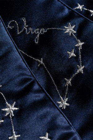Close-up of Stellar Zodiac Silk Eye Mask with detailed Virgo constellation embroidery.