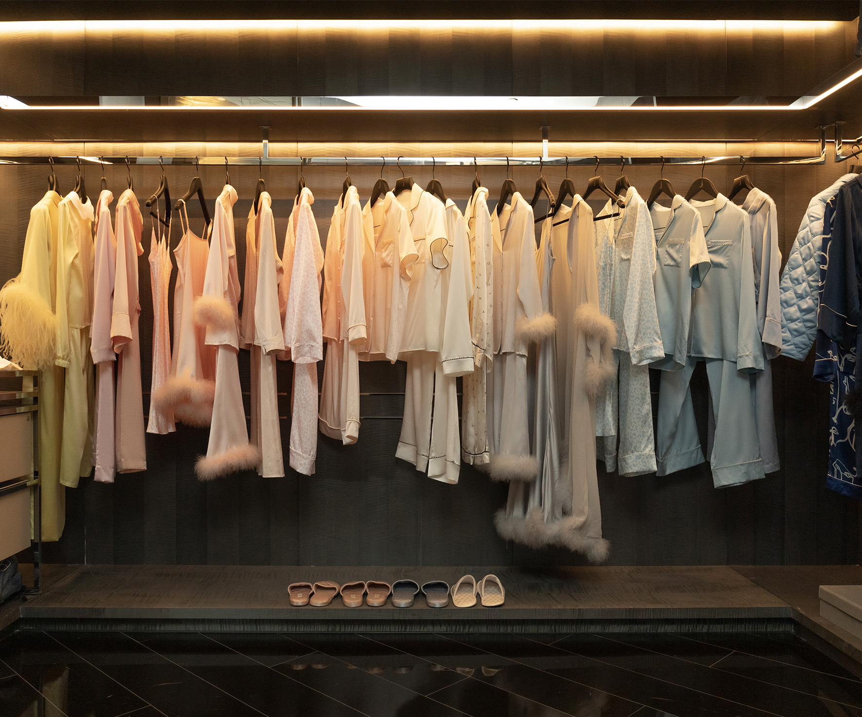 MANITO's exquisite silk apparel collection displayed at J Hotel Shanghai Center, celebrating the union of luxury and height at one of the world's tallest hotels, the "Top of Shanghai".