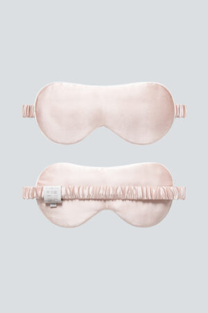 MANITO HA Silk Eye Mask in pink displayed front and back, crafted for a smooth and relaxing rest.