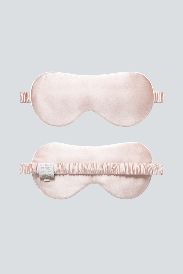 MANITO HA Silk Eye Mask in pink displayed front and back, crafted for a smooth and relaxing rest.
