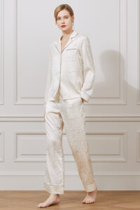 Front view of MANITO Jungle Tiger Print Pajama Set showing button-down silk shirt and straight-leg pants.