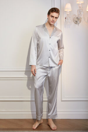Elegant men in classic Monogram Men's Silk Pajama Set with white piping detail.