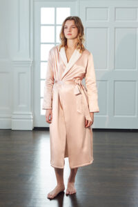 Elegant soft pink silk terry robe for women with contrasting cream lapel and tie waist.