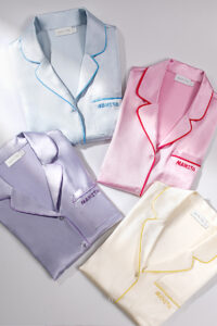Macaron Pajama Set collection showcasing silk pajama sets in various colors with elegant piping details and embroidered MANITO logo.