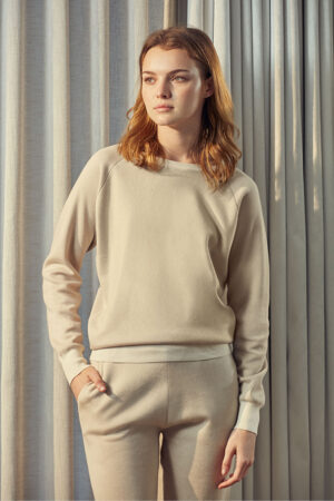 Woman adorned in MANITO's Sandstone Brown Color Contrast Silk-Cashmere Crew-Neck Set, exuding casual sophistication.