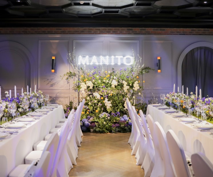 MANITO SS 2023 Gala Dinner setting showcasing a lavish table arrangement under soft lighting, reflecting the natural splendor and botanical inspiration of Butchart Gardens.