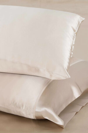 Soft Pink silk pillowcase set by The 22 Silk Pillowcase Set, exuding luxury and comfort.
