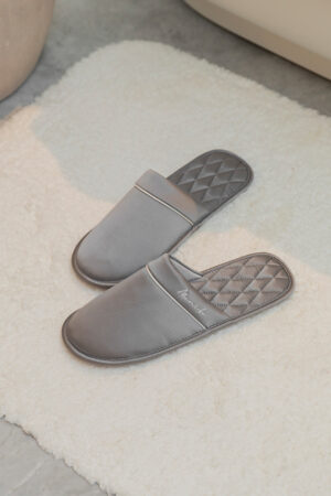 Authentic Men's Silk Lounge Shoes in grey, showing satin-silk finish with lamb-leather trim and the diamond-quilted insole detail.