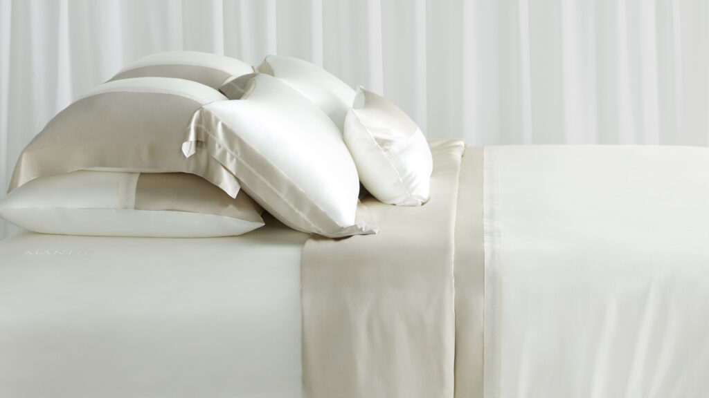 Plush flat sheets and pillows in a serene bedroom setting