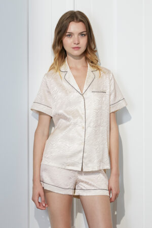 Model in MANITO Jungle Tiger Print Short Pajama Set with silk short-sleeve shirt and matching shorts.