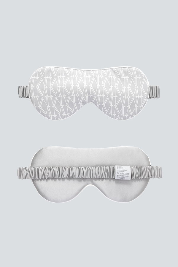Classic Monogram Silk Eye Mask is shown on the front and back, featuring the new MANITO Double M print for a classic look.