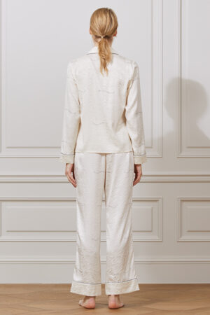 Back view of MANITO Jungle Tiger Print Pajama Set with relaxed silhouette and flowing silk drape.