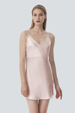 Freya Women's Silk Slip Dress in blush pink showcasing fluid drape and double shoulder straps for added charm.