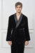 Model wearing the Rome Velvet Men's Short Robe, highlighting the matte black velvet and smooth charmeuse collar.