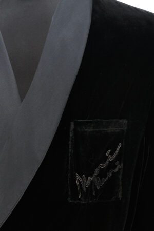 Detail shot of the Rome Velvet Men's Short Robe collar and pocket, showing the matte velvet finish and smooth charmeuse contrast.